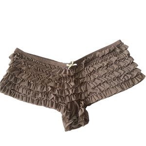 NEW without tags cheeky full of ruffles, tag was removed but im sure is a large